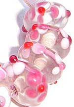 Бусины стеклянные лэмпворк (венецианские, lampwork) ручной работы. Розовые с цветами. Овальные 8х12 мм.