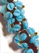 Бусины стеклянные лэмпворк (венецианские, lampwork) коричневые с 4 голубыми цветками